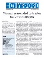 “Woman Rear-Ended by Tractor Trailer Wins $830K”